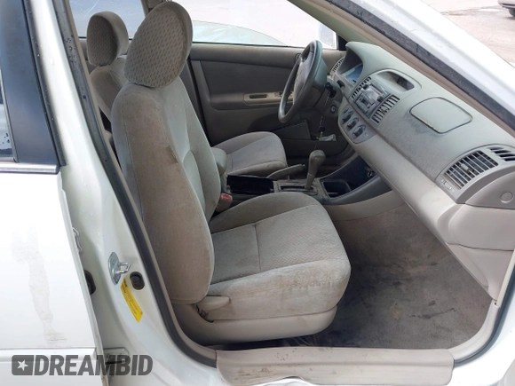 2004 Toyota Camry LE with VIN 4T1BF30K54U071960, listed as a IAAI auction lot 41513417 with 165,738 mi miles. Bid and sale history available at carsss.com. Image 5.