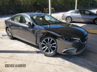 2016 Mazda Mazda6 i Grand Touring with VIN JM1GJ1W52G1430377, listed as a Copart auction lot 70019244 with 197,317 mi miles and Salvage Title. Bid and sale history available at carsss.com. Image 4.