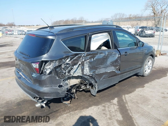 2018 Ford Escape SE z VIN 1FMCU9GD6JUD55937, wystawiony jako IAAI lot #41898592 z przebiegiem 37 800 mil mil oraz . Historia ofert i sprzedaży dostępna na DreamBid. Obrazek 4.