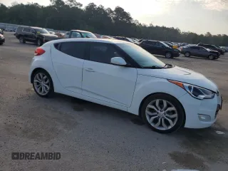 2013 Hyundai Veloster w/Gray Int with VIN KMHTC6ADXDU130886, listed as a Copart auction lot 57478095 with 130,008 mi miles and Salvage title. Bid and sale history available at DreamBid. Image 4.