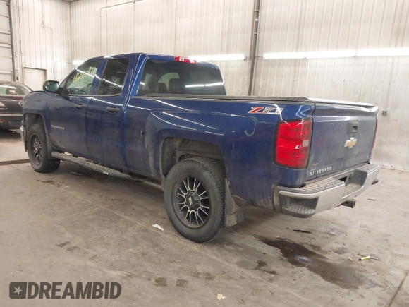 2014 Chevrolet Silverado 1500 LT with VIN 1GCVKREC2EZ155062, listed as a IAAI auction lot 41260471 with 135,762 mi miles and . Bid and sale history available at DreamBid. Image 3.