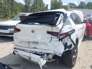 2020 Alfa Romeo Stelvio with VIN ZASPAJAN9L7C91080, listed as a IAAI auction lot 40416497 with 51,384 mi miles. Bid and sale history available at carsss.com. Image 6.