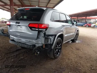 2018 Jeep Grand Cherokee Altitude with VIN 1C4RJEAG3JC358884, listed as a IAAI auction lot 42025317 with 91,451 mi miles. Bid and sale history available at carsss.com. Image 4.