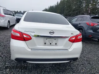 2016 Nissan Altima SV with VIN 1N4AL3AP3GC152359, listed as a IAAI auction lot 41681963 with 70,609 mi miles and . Bid and sale history available at DreamBid. Image 16.