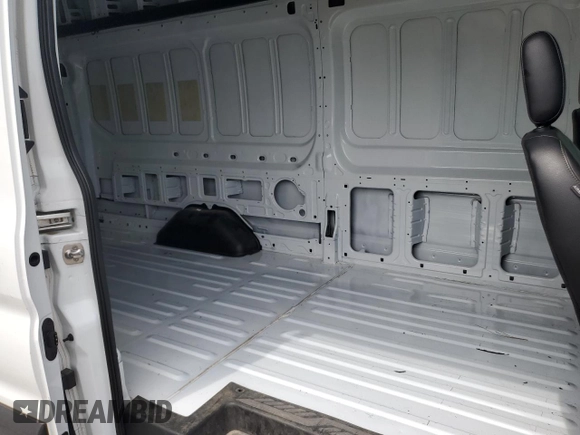 2024 Ford Transit Cargo z VIN 1FTBW3X85RKA98853, wystawiony jako Copart lot #60543695 z przebiegiem 26 182 mil mil oraz Szkoda całkowita • Salvage title. Historia ofert i sprzedaży dostępna na DreamBid. Obrazek 11.