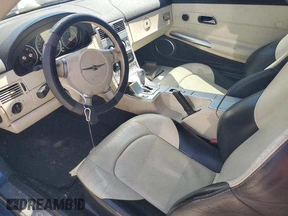 2006 Chrysler Crossfire Limited с VIN 1C3AN65L76X061832, выставлен на аукционе Copart как лот 57773895 с пробегом 107 153 миль миль и Списание • Salvage title. История ставок и продаж доступна на DreamBid. Изображение 7.