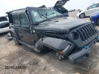 2023 Jeep Wrangler Sahara with VIN 1C4JJXP62PW629335, listed as a IAAI auction lot 42076546 with Not provided miles and . Bid and sale history available at DreamBid. Image 1.