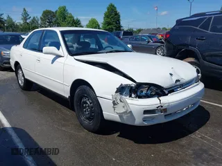 1995 Toyota Camry LE z VIN JT2SK12EXS0293130, wystawiony jako IAAI lot #42226458 z przebiegiem 147 332 mil mil oraz . Historia ofert i sprzedaży dostępna na DreamBid. Obrazek 1.