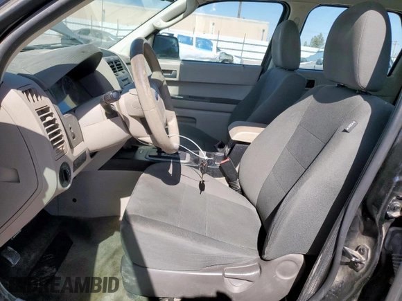 2011 Ford Escape XLS with VIN 1FMCU0C79BKC04115, listed as a Copart auction lot 56982375 with 193,078 mi miles and Salvage title. Bid and sale history available at DreamBid. Image 7.
