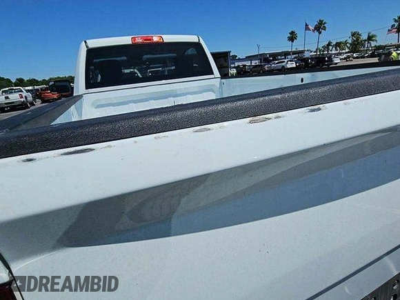 2023 Ram 1500 Tradesman with VIN 3C6JR6DT5PG673896, listed as a IAAI auction lot 42145203 with 46,530 mi miles and . Bid and sale history available at DreamBid. Image 1.
