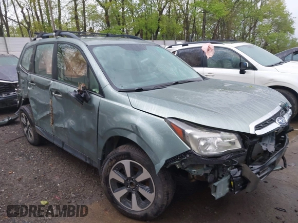 2017 Subaru Forester z VIN JF2SJABC4HH452602, wystawiony jako IAAI lot #42197639 z przebiegiem 141 385 mil mil oraz . Historia ofert i sprzedaży dostępna na DreamBid. Obrazek 1.
