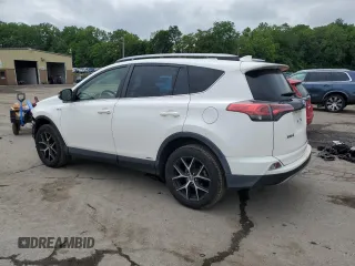 2018 Toyota RAV4 Hybrid SE with VIN JTMJJREV1JD172042, listed as a Copart auction lot 61418305 with 143,902 mi miles and Salvage title. Bid and sale history available at DreamBid. Image 2.