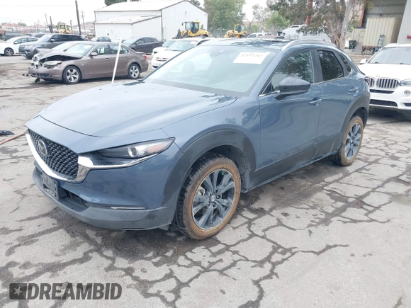 2022 Mazda CX-30 S Carbon Edition with VIN 3MVDMBCL0NM456154, listed as a IAAI auction lot 42153202 with 40,372 mi miles and . Bid and sale history available at DreamBid. Image 17.