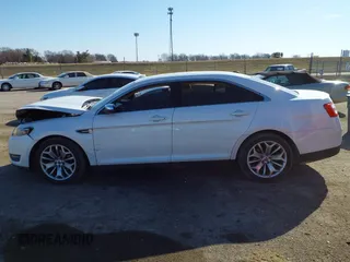 2014 Ford Taurus Limited with VIN 1FAHP2F89EG155934, listed as a IAAI auction lot 41760703 with 130,280 mi miles. Bid and sale history available at carsss.com. Image 15.