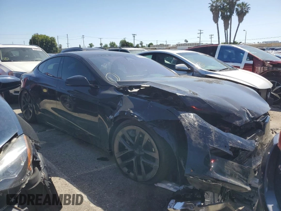 2022 Tesla Model S Plaid z VIN 5YJSA1E62NF471696, wystawiony jako Copart lot #56249555 z przebiegiem Nie podano mil oraz Szkoda całkowita • Salvage title. Historia ofert i sprzedaży dostępna na DreamBid. Obrazek 4.