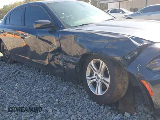 2019 Dodge Charger SXT with VIN 2C3CDXBG2KH695976, listed as a IAAI auction lot 41859947 with 161,093 mi miles and . Bid and sale history available at DreamBid. Image 6.