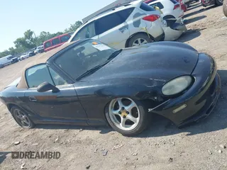 1999 Mazda MX-5 Miata with VIN JM1NB3539X0112181, listed as a IAAI auction lot 42397232 with 11 mi miles and . Bid and sale history available at DreamBid. Image 13.