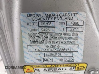 1999 Jaguar XJ with VIN SAJHX1043XC856474, listed as a IAAI auction lot 41626649 with 103,266 mi miles and . Bid and sale history available at DreamBid. Image 9.