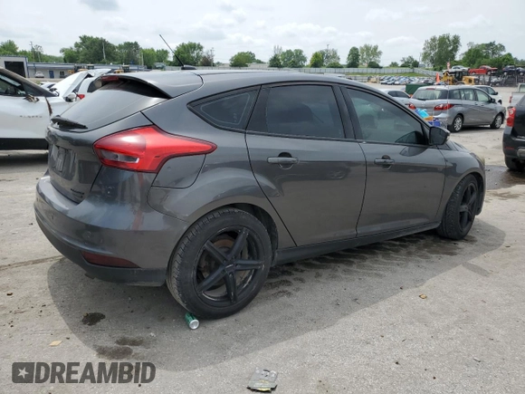 2015 Ford Focus Titanium z VIN 1FADP3N2XFL357224, wystawiony jako Copart lot #55626575 z przebiegiem 159 422 mil mil oraz Szkoda całkowita • Salvage title. Historia ofert i sprzedaży dostępna na DreamBid. Obrazek 3.
