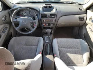 2001 Nissan Sentra GXE with VIN 3N1CB51D31L502482, listed as a Copart auction lot 50762195 with 185,455 mi miles and Salvage title. Bid and sale history available at DreamBid. Image 8.