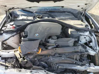 2015 BMW 4 Series 428i with VIN WBA4A9C55FGL86731, listed as a Copart auction lot 42700155 with 110,897 mi miles and Salvage title. Bid and sale history available at DreamBid. Image 12.