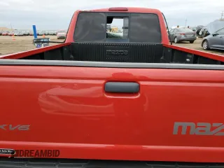 2001 Mazda B-Series 2WD Truck DS with VIN 4F4YR16U11TM27512, listed as a Copart auction lot 85065114 with 171,504 mi miles and Salvage Title. Bid and sale history available at carsss.com. Image 10.