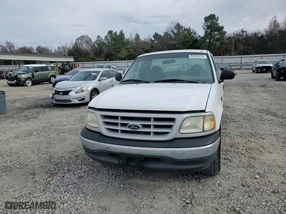 1999 Ford F-150 Work Series with VIN 1FTRF17W1XNA20017, listed as a Copart auction lot 84550234 with 0 mi miles and Salvage Title. Bid and sale history available at carsss.com. Image 11.