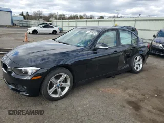 2015 BMW 3 Series 328i xDrive with VIN WBA3B5C52FF960001, listed as a Copart auction lot 52235695 with 80,950 mi miles and Salvage Title. Bid and sale history available at carsss.com. Image 1.