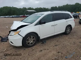 2013 Honda Odyssey EX-L with VIN 5FNRL5H62DB048370, listed as a Copart auction lot 63013465 with 129,552 mi miles and Salvage title. Bid and sale history available at DreamBid. Image 1.