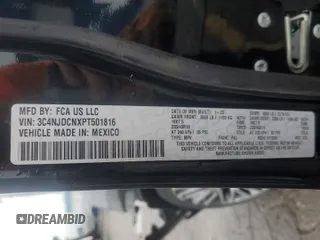 2023 Jeep Compass (RED) Edition z VIN 3C4NJDCNXPT501816, wystawiony jako Copart lot #55733075 z przebiegiem 25 039 mil mil oraz Szkoda całkowita • Salvage title. Historia ofert i sprzedaży dostępna na DreamBid. Obrazek 13.