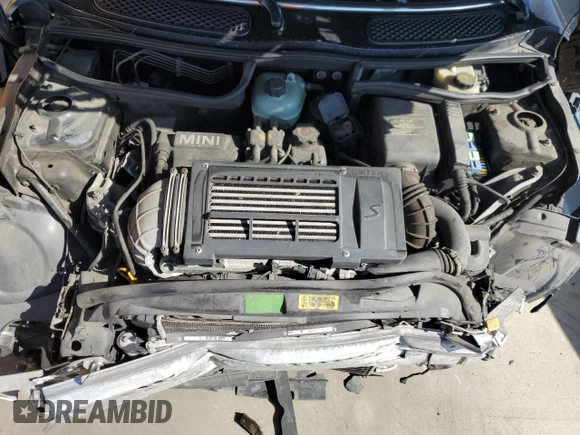 2006 MINI Convertible S with VIN WMWRH33536TK59272, listed as a Copart auction lot 51144475 with 46,024 mi miles and Salvage Title. Bid and sale history available at DreamBid. Image 11.