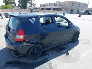 2007 Honda Fit Sport z VIN JHMGD38667S060679, wystawiony jako IAAI lot #42350102 z przebiegiem 253 595 mil mil oraz . Historia ofert i sprzedaży dostępna na DreamBid. Obrazek 4.