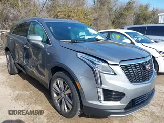 2025 Cadillac XT5 FWD Premium Luxury with VIN 1GYKNCRS1SZ120351, listed as a IAAI auction lot 41334881 with 4,915 mi miles. Bid and sale history available at carsss.com. Image 1.