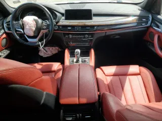 2017 BMW X6 sDrive35i z VIN 5UXKU0C52H0F99663, wystawiony jako Copart lot #57293445 z przebiegiem 71 491 mil mil oraz Szkody całkowita. Historia ofert i sprzedaży dostępna na DreamBid. Obrazek 8.
