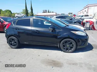 2011 Ford Fiesta SES with VIN 3FADP4FJ9BM181965, listed as a IAAI auction lot 42092140 with 150,304 mi miles. Bid and sale history available at carsss.com. Image 14.