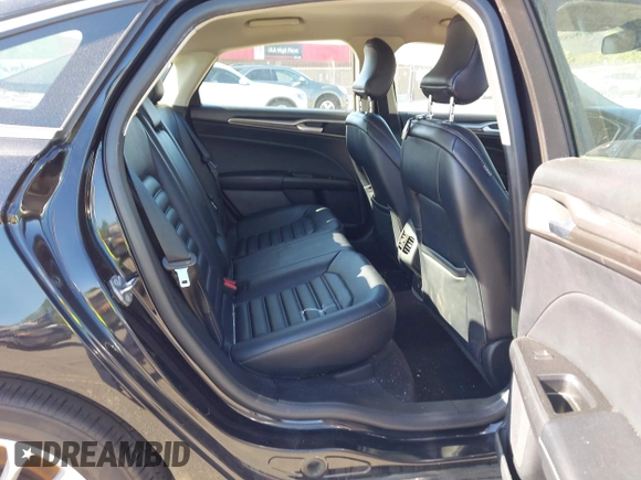 2019 Ford Fusion SEL with VIN 3FA6P0MU6KR252797, listed as a IAAI auction lot 41994504 with 106,029 mi miles and . Bid and sale history available at DreamBid. Image 8.