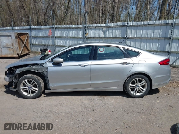 2018 Ford Fusion SE z VIN 3FA6P0H77JR226390, wystawiony jako IAAI lot #42120981 z przebiegiem 114 057 mil mil oraz . Historia ofert i sprzedaży dostępna na DreamBid. Obrazek 15.