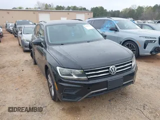 2018 Volkswagen Tiguan S with VIN 3VV0B7AX4JM098495, listed as a IAAI auction lot 41937757 with 179,168 mi miles and . Bid and sale history available at DreamBid. Image 1.
