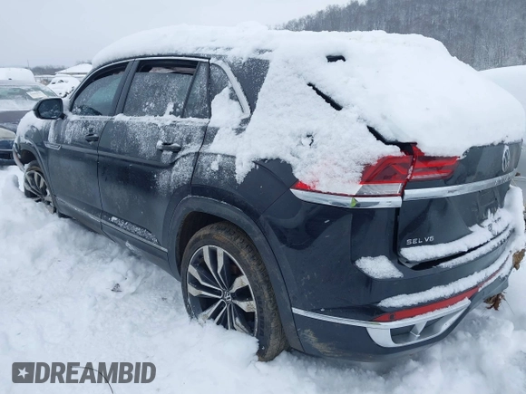 2022 Volkswagen Atlas SEL Premium R-Line with VIN 1V2FE2CA4NC221469, listed as a IAAI auction lot 41236003 with 57,017 mi miles and . Bid and sale history available at DreamBid. Image 3.