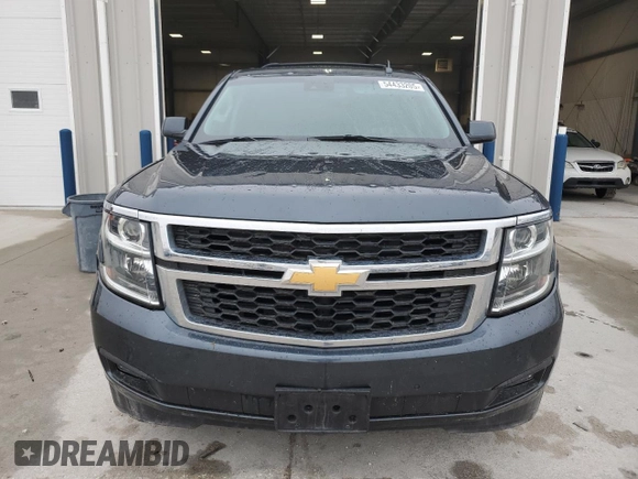 2019 Chevrolet Tahoe LT with VIN 1GNSKBKCXKR212450, listed as a Copart auction lot 54433205 with 119,907 mi miles and Salvage title. Bid and sale history available at DreamBid. Image 5.