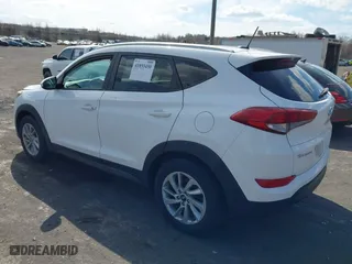 2016 Hyundai Tucson SE with VIN KM8J3CA48GU087840, listed as a IAAI auction lot 41855450 with 106,524 mi miles. Bid and sale history available at carsss.com. Image 3.