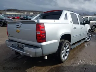 2013 Chevrolet Avalanche LTZ with VIN 3GNTKGE73DG306592, listed as a IAAI auction lot 41695072 with 243,700 mi miles. Bid and sale history available at carsss.com. Image 4.