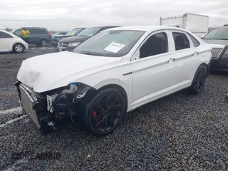 2019 Volkswagen Jetta GLI S z VIN 3VW6T7BU2KM202992, wystawiony jako IAAI lot #40896812 z przebiegiem 44 348 mil mil oraz . Historia ofert i sprzedaży dostępna na DreamBid. Obrazek 2.