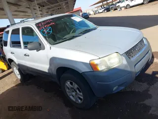 2004 Ford Escape XLT with VIN 1FMYU03114KA43652, listed as a IAAI auction lot 41701166 with 201,035 mi miles. Bid and sale history available at carsss.com. Image 1.