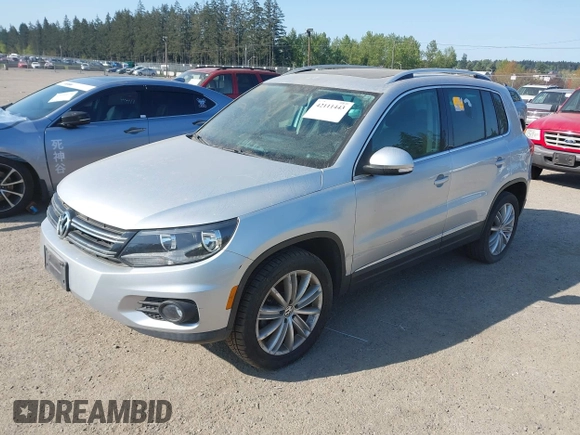 2012 Volkswagen Tiguan S with VIN WVGBV7AX5CW602405, listed as a IAAI auction lot 42111443 with 109,654 mi miles and . Bid and sale history available at DreamBid. Image 2.