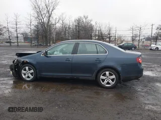 2009 Volkswagen Jetta SE z VIN 3VWRZ71K49M016683, wystawiony jako IAAI lot #41530644 z przebiegiem 106 148 mil mil oraz . Historia ofert i sprzedaży dostępna na DreamBid. Obrazek 14.