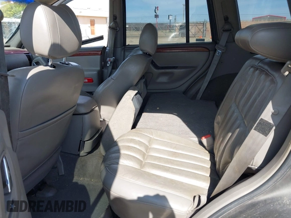 1999 Jeep Grand Cherokee Limited with VIN 1J4GW68N5XC773100, listed as a IAAI auction lot 41998432 with Not provided miles and . Bid and sale history available at DreamBid. Image 8.