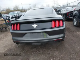 2016 Ford Mustang V6 with VIN 1FA6P8AM5G5337594, listed as a IAAI auction lot 41864037 with 128,117 mi miles and . Bid and sale history available at carsss.com. Image 16.