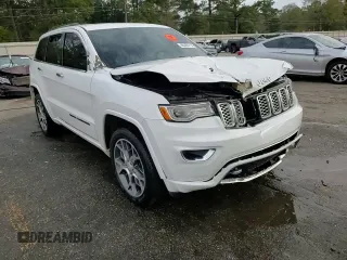 2021 Jeep Grand Cherokee Overland with VIN 1C4RJFCG1MC671472, listed as a Copart auction lot 86326714 with 103,760 mi miles and Salvage title. Bid and sale history available at DreamBid. Image 14.