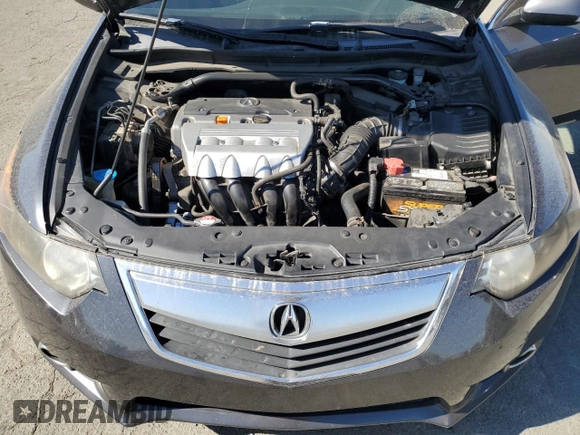 2011 Acura TSX z VIN JH4CU2E67BC011197, wystawiony jako Copart lot #77825124 z przebiegiem 132 648 mil mil oraz Szkoda całkowita • Salvage title. Historia ofert i sprzedaży dostępna na DreamBid. Obrazek 11.